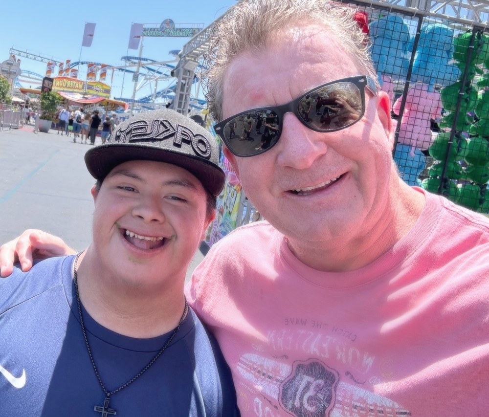 Tim with a Special Olympics Southern California athlete at a community event